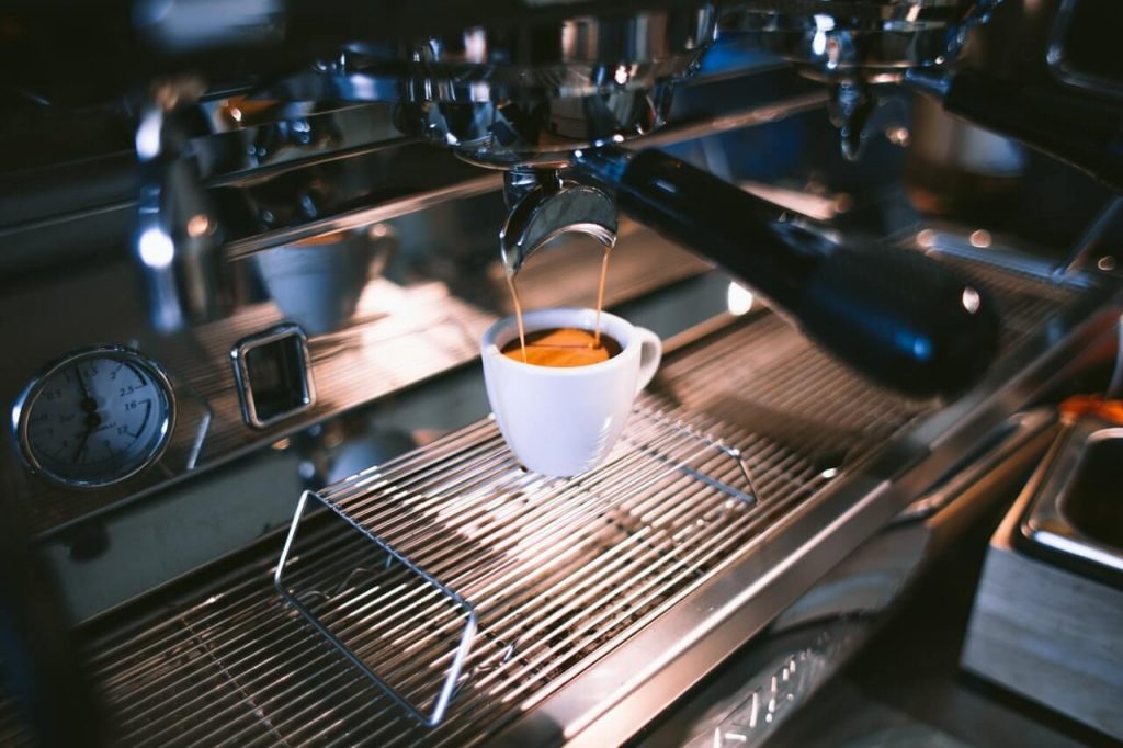 Machine Pulling Espresso Shot Machine Pulling Espresso Shot